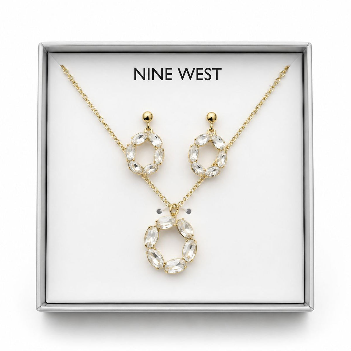 Nine West – Set de Collar y Aretes Dorados con Cristales Transparentes