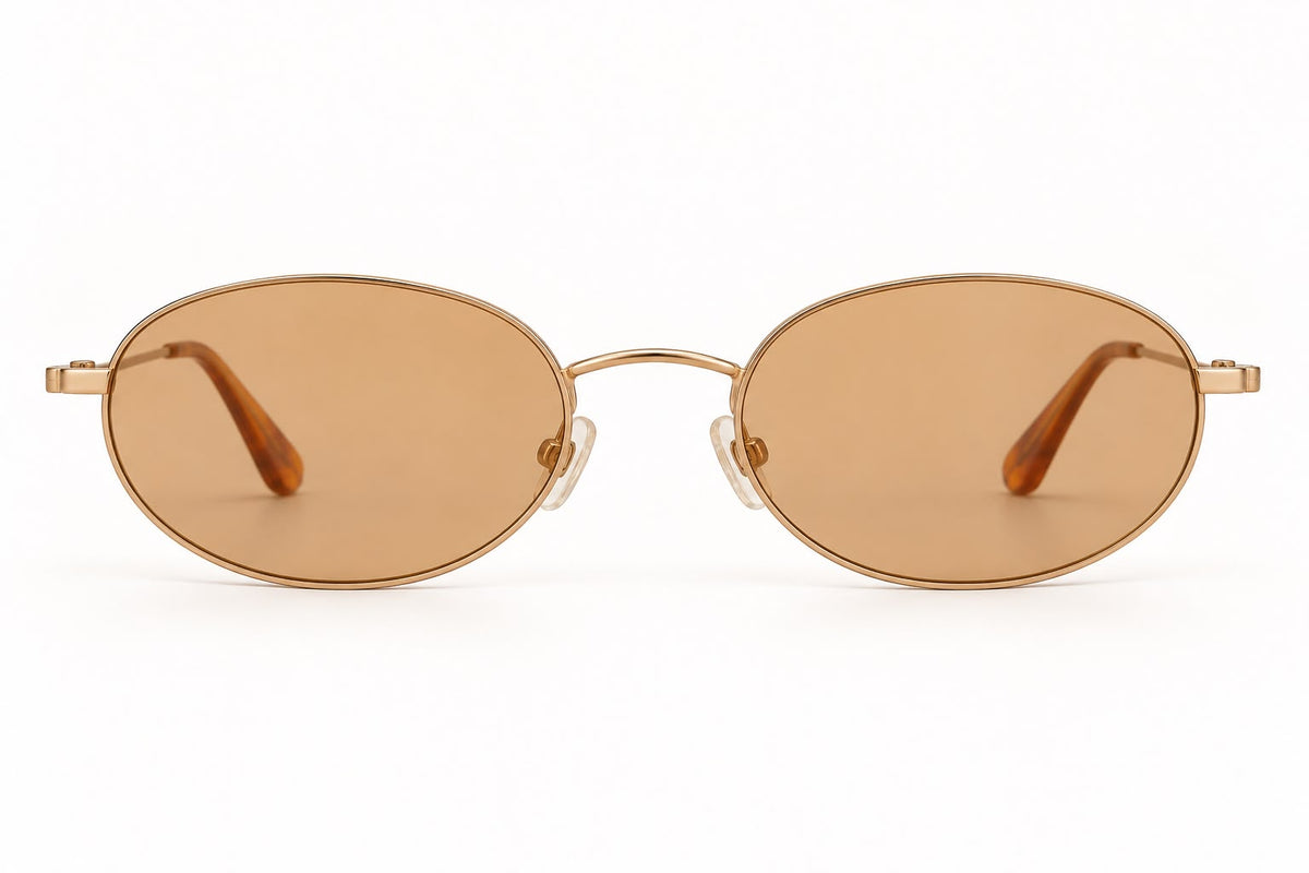 BCBG Generation – Lentes de Sol Ovalados Dorados con Lente Ámbar