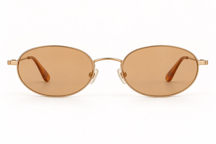 BCBG Generation – Lentes de Sol Ovalados Dorados con Lente Ámbar